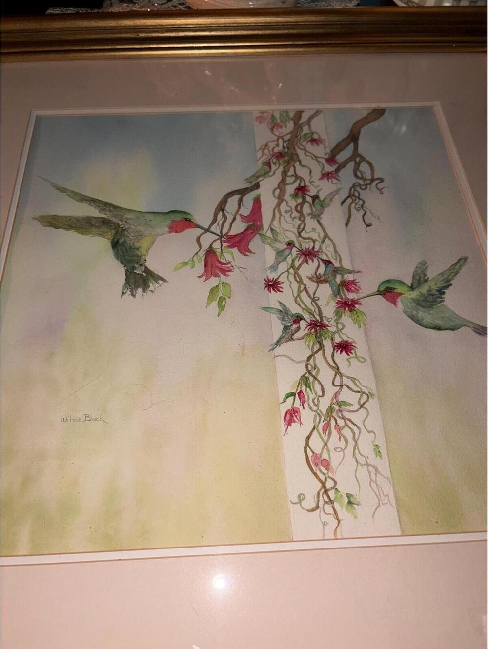 This is an original framed watercolor painting of hummingbirds by Wilma Black.